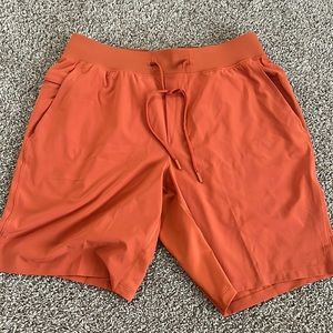 Orange men’s lululemon 7” short
